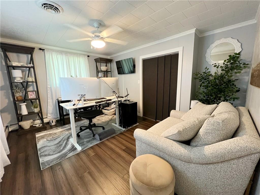 92 Blom Road Grove City, PA 16127 - Photo 27 of 28 a living room with furniture and a wooden floor