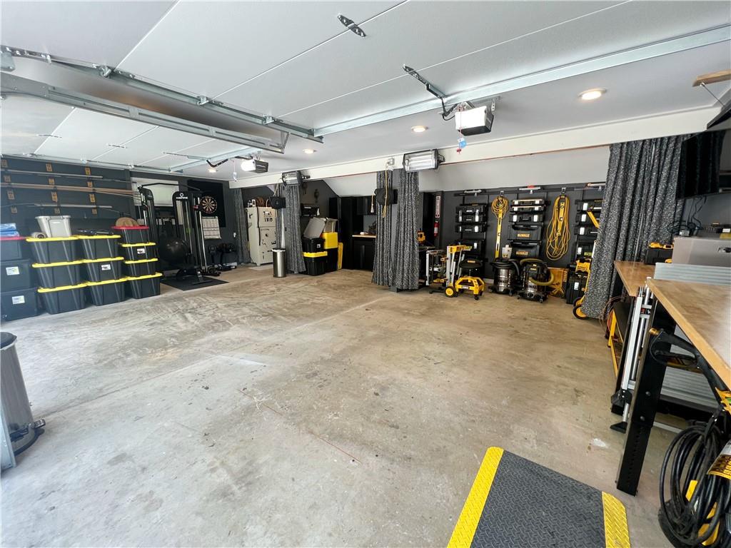 92 Blom Road Grove City, PA 16127 - Photo 8 of 28 a view of a room with gym equipment