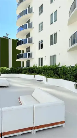 a view of a livingroom with furniture and furniture