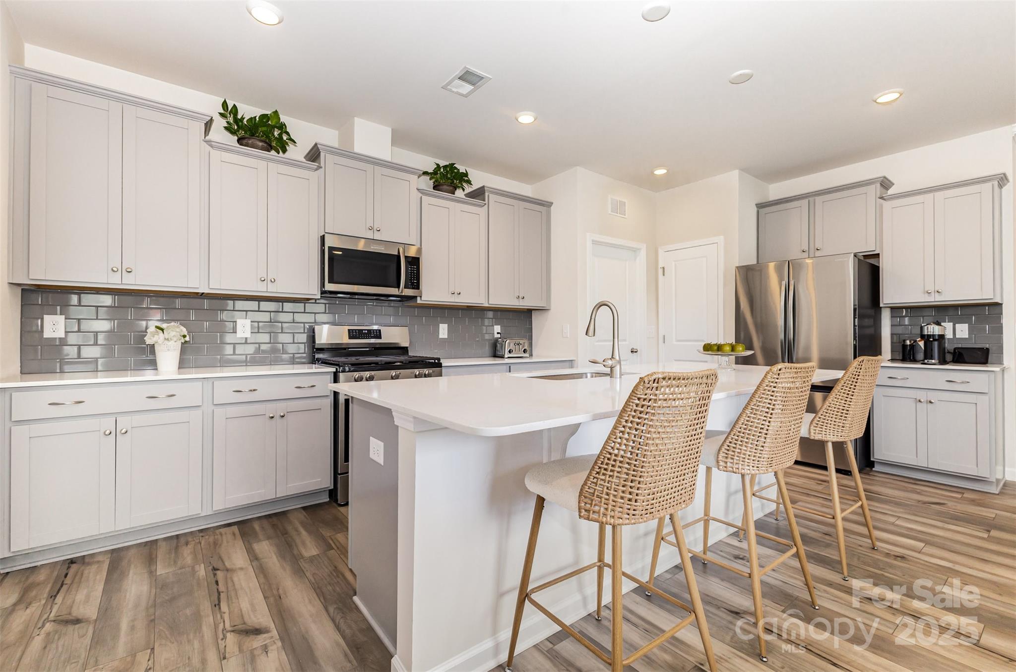 5841 Soft Shell Drive Lancaster, SC 29720 - Photo 8 of 46 a kitchen with a sink cabinets and refrigerator