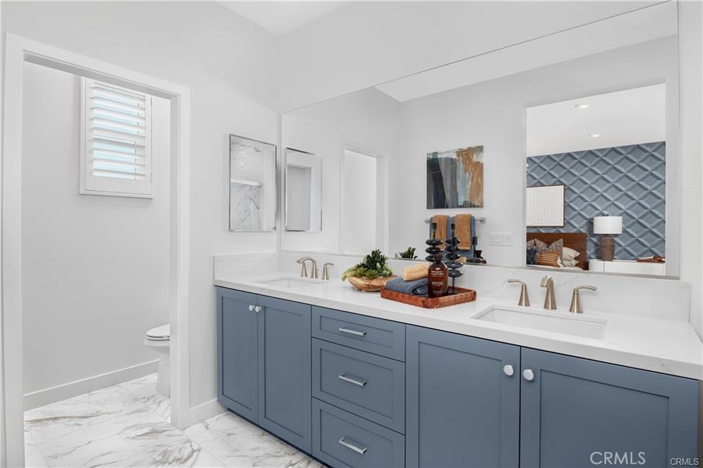 22060 Florence Circle Walnut, CA 91789 - Photo 12 of 16 a view of bathroom with sink and mirror