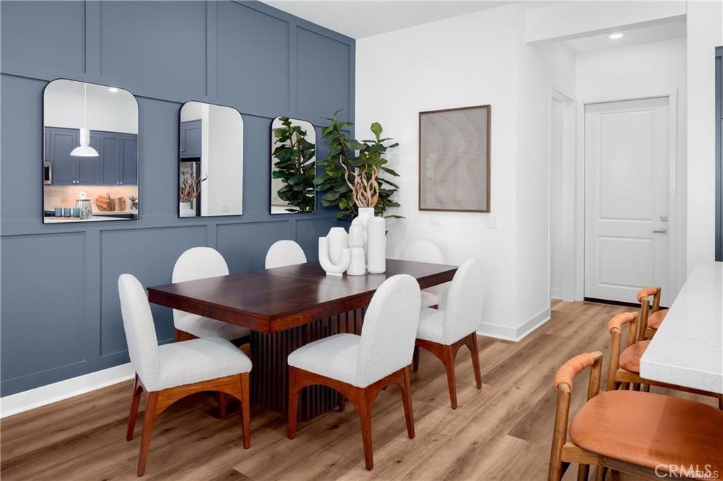 22060 Florence Circle Walnut, CA 91789 - Photo 4 of 16 a view of a dining room with furniture and wooden floor