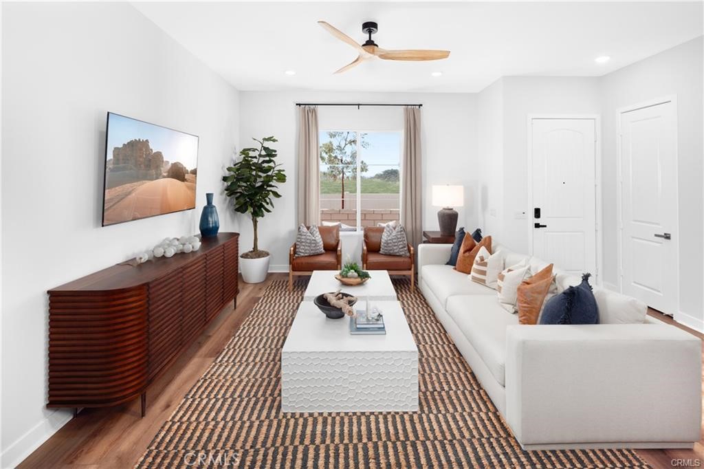22060 Florence Circle Walnut, CA 91789 - Photo 6 of 16 a living room with furniture fireplace and flat screen tv