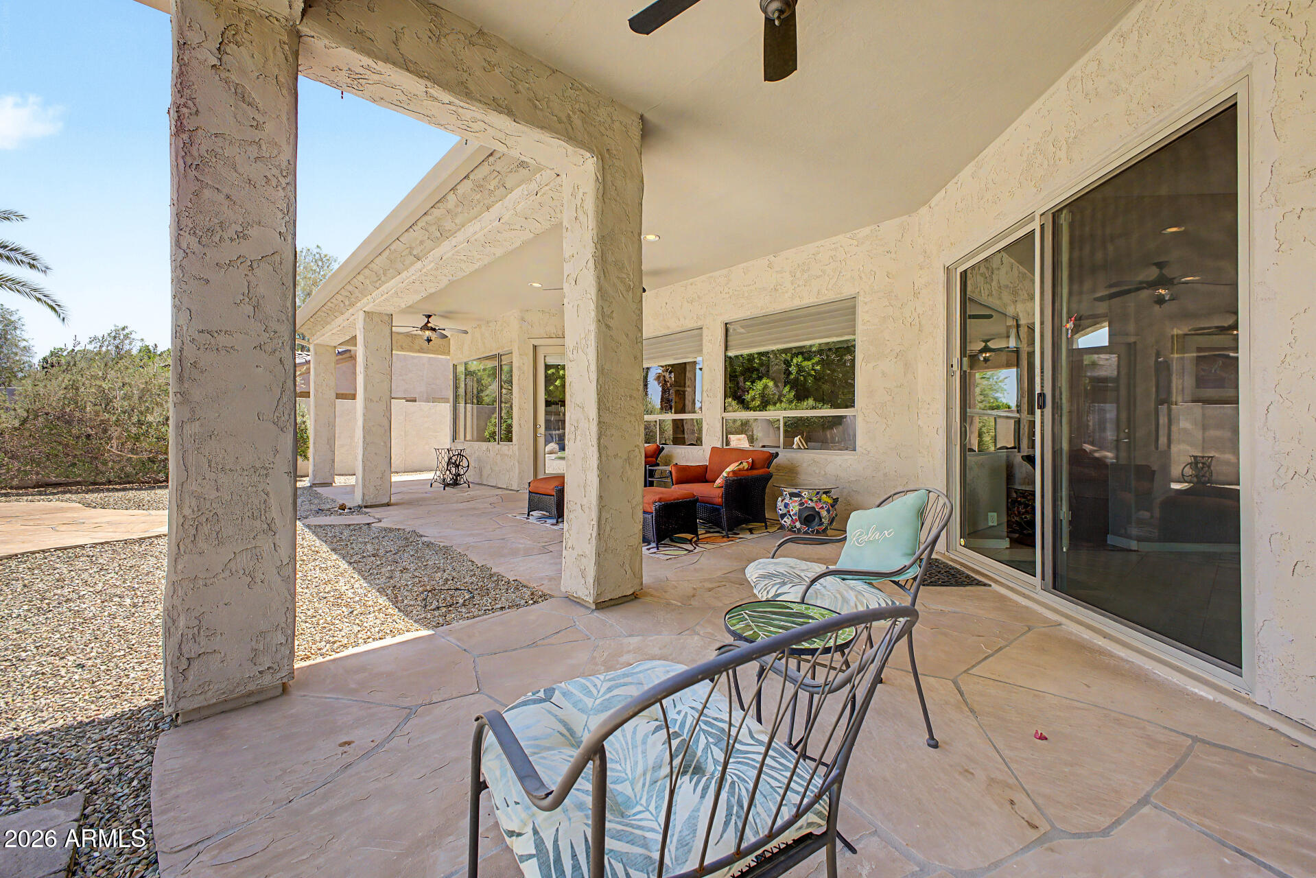 1632 West Frye Road Phoenix, AZ 85045 - Photo 26 of 37 a outdoor space with patio the couches and a dining table with balcony view