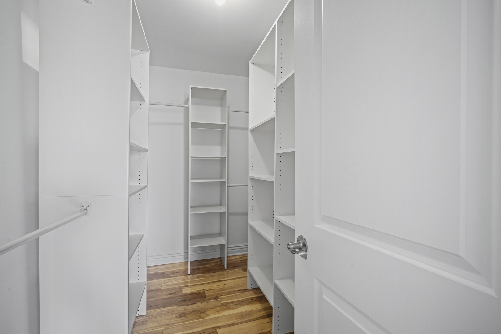 1615 East Central Road, Unit 417C Arlington Heights, IL 60005 - Photo 17 of 24 a view of walk in closet with empty racks