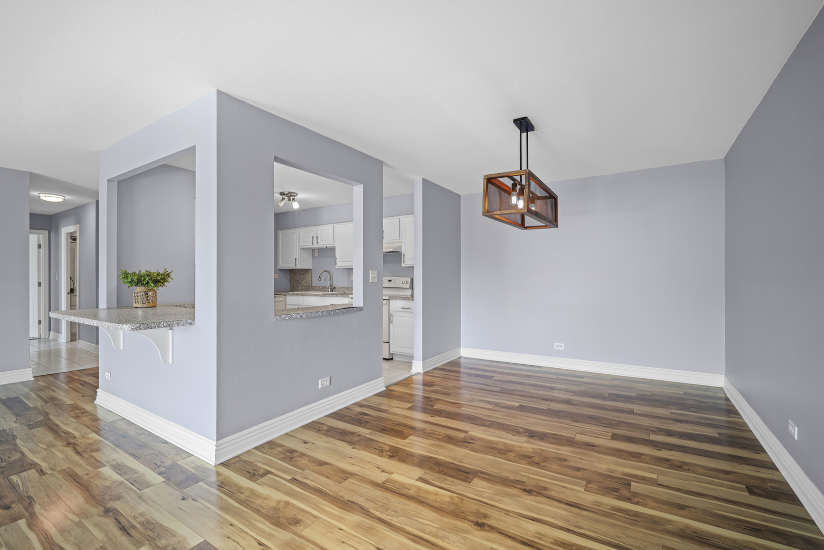 1615 East Central Road, Unit 417C Arlington Heights, IL 60005 - Photo 7 of 24 a view of an entryway with wooden floor