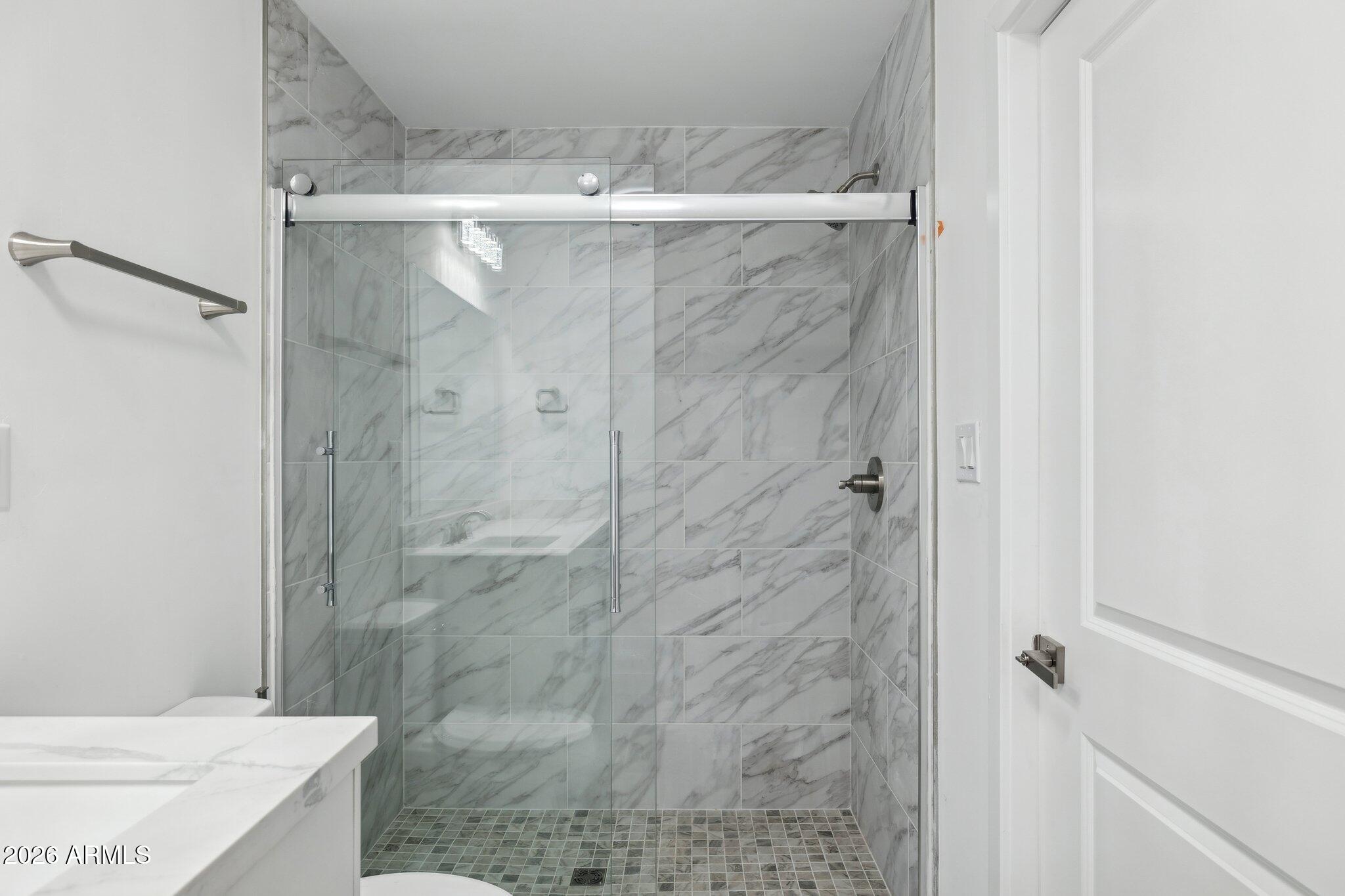 4144 North 36th Street Phoenix, AZ 85018 - Photo 15 of 30 a bathroom with a shower