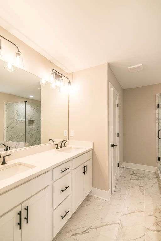 2635 Radvell Court Decatur, GA 30034 - Photo 14 of 19 a bathroom with a shower sink and mirror