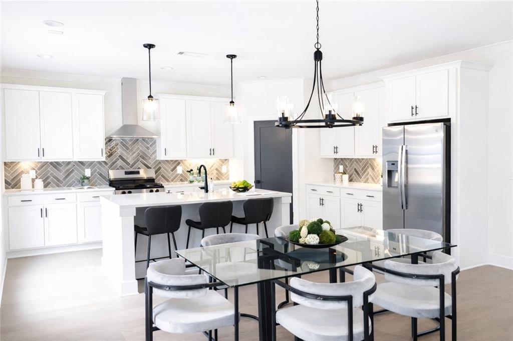 2635 Radvell Court Decatur, GA 30034 - Photo 3 of 19 a view of kitchen with dining table and chairs