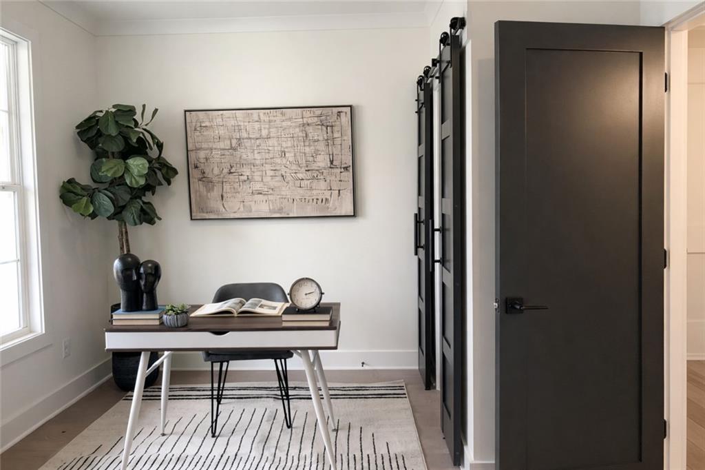 2635 Radvell Court Decatur, GA 30034 - Photo 5 of 19 a view of a workspace room with furniture and wooden floor