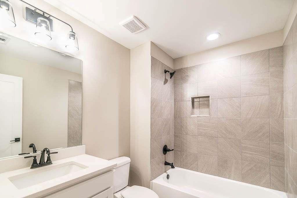 2635 Radvell Court Decatur, GA 30034 - Photo 8 of 19 a bathroom with a sink a toilet and shower