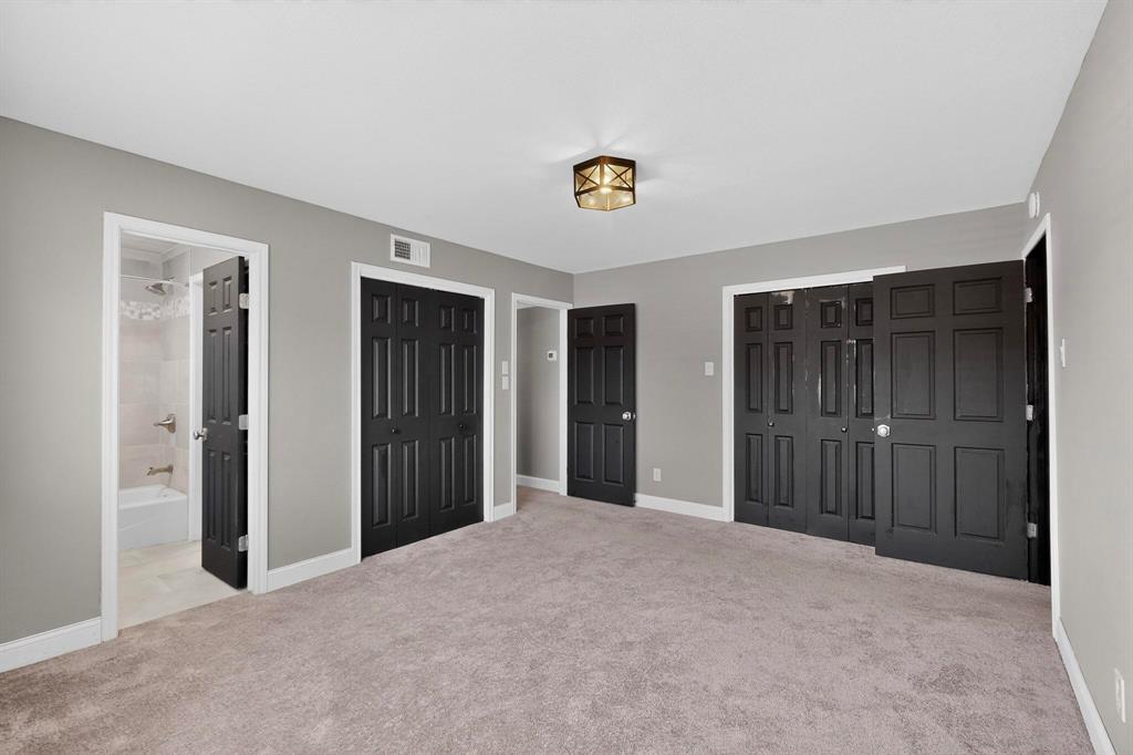 3675 Rickshaw Drive, Unit 3671 Dallas, TX 75229 - Photo 21 of 32 Second Bedroom with Private Bath