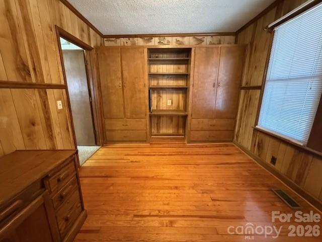 2041 Clyde Street Dallas, NC 28034 - Photo 11 of 46 a bedroom with a bed and a dresser