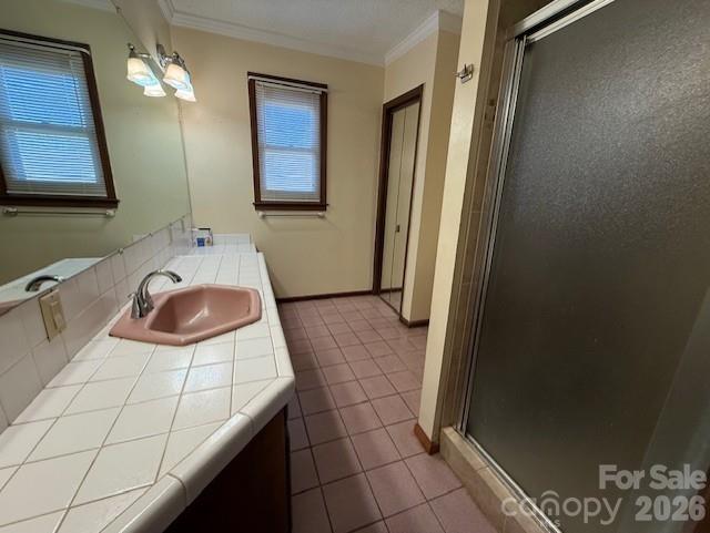 2041 Clyde Street Dallas, NC 28034 - Photo 12 of 46 a bathroom with a sink a mirror and vanity