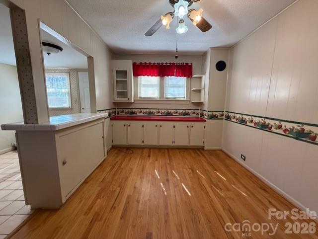 2041 Clyde Street Dallas, NC 28034 - Photo 16 of 46 a view of a kitchen with wooden floor and staircase