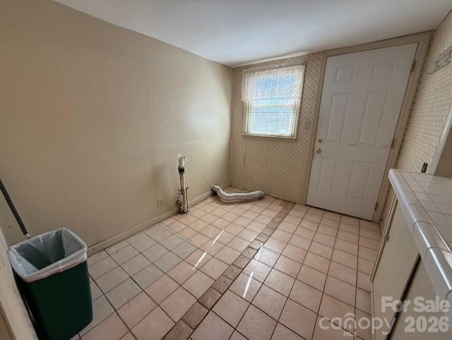 2041 Clyde Street Dallas, NC 28034 - Photo 19 of 46 a bedroom with a bed and a window