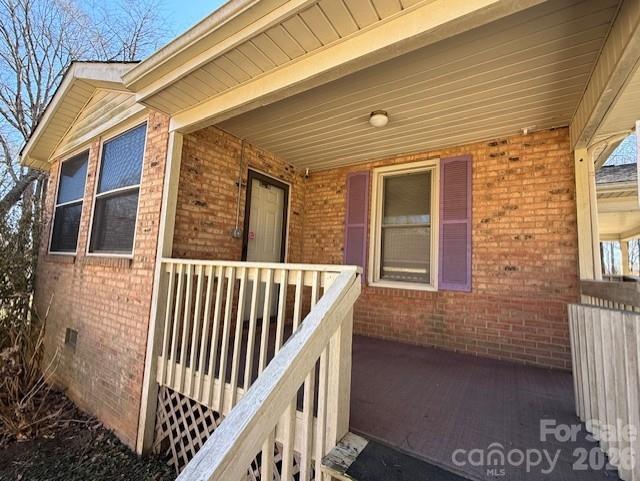 2041 Clyde Street Dallas, NC 28034 - Photo 2 of 46 a view of a brick house with many windows
