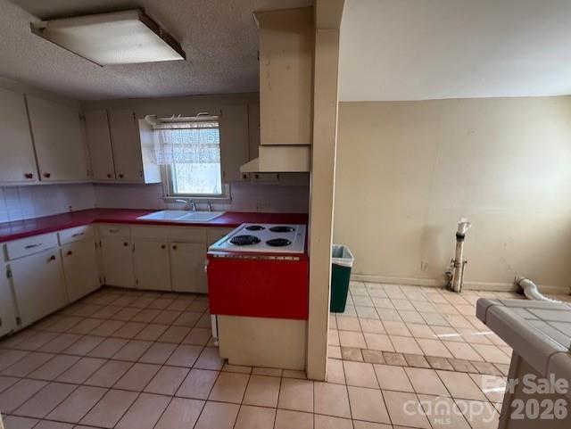 2041 Clyde Street Dallas, NC 28034 - Photo 21 of 46 a kitchen with stainless steel appliances a sink a stove a refrigerator and cabinets