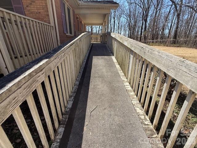 2041 Clyde Street Dallas, NC 28034 - Photo 3 of 46 a view of a balcony with wooden floor and stairs