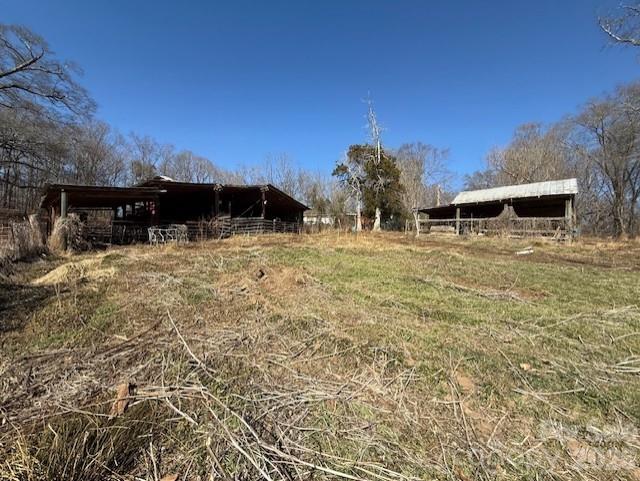 2041 Clyde Street Dallas, NC 28034 - Photo 38 of 46 a view of a house with a yard