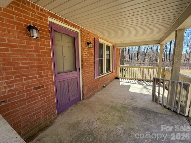 2041 Clyde Street Dallas, NC 28034 - Photo 4 of 46 a view of a porch with wooden floor and outdoor space