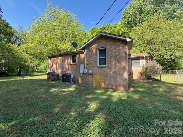 2041 Clyde Street Dallas, NC 28034 - Photo 43 of 46 a view of a house with a yard