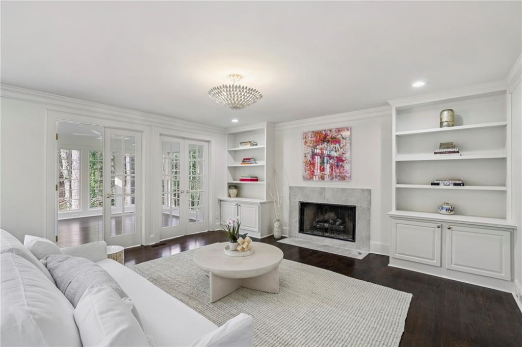 105 Inverness Approach Roswell, GA 30075 - Photo 15 of 51 a living room with furniture and a fireplace