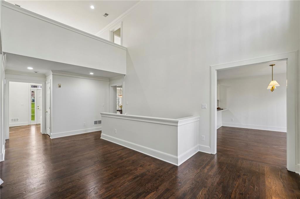 105 Inverness Approach Roswell, GA 30075 - Photo 18 of 51 a view of an empty room with wooden floor