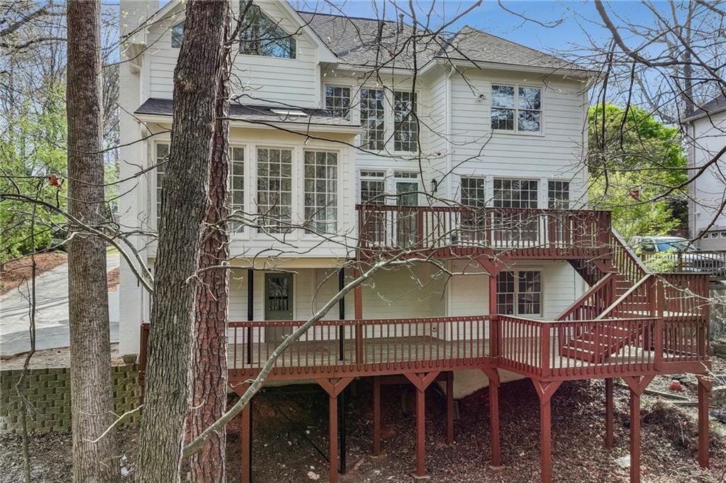 105 Inverness Approach Roswell, GA 30075 - Photo 43 of 51 front view of a house with a balcony