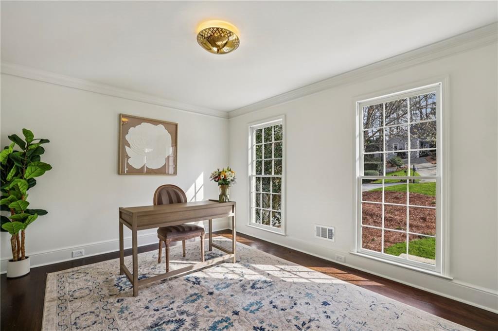 105 Inverness Approach Roswell, GA 30075 - Photo 9 of 51 a view of a workspace with furniture and a window