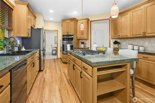 a view of a kitchen with a window