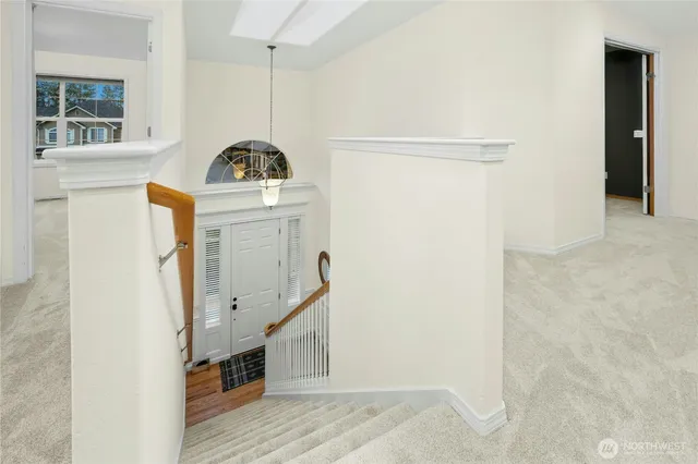 a backyard of a house with plants and trees