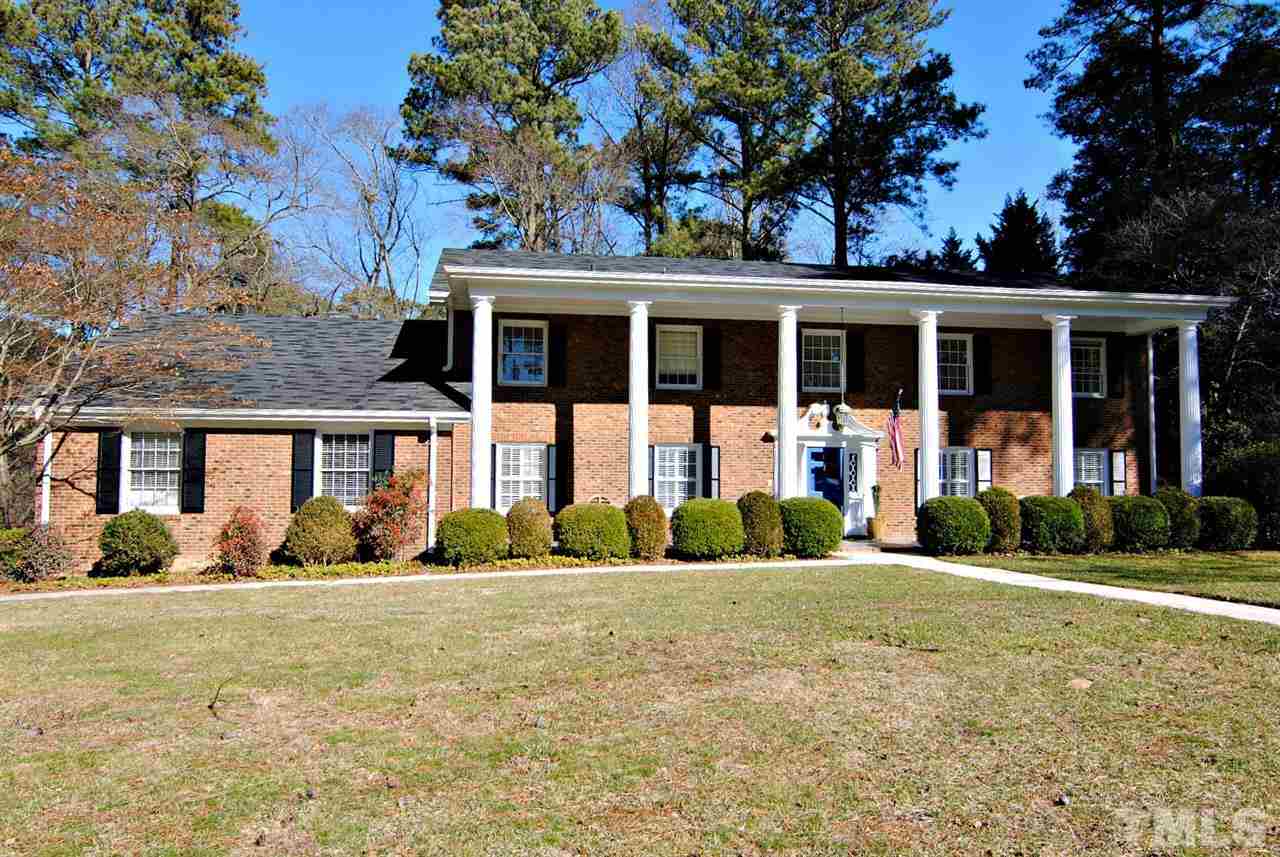304 Foxhall Street Raleigh, NC 27609 - Photo 2 of 25 front view of a house with a yard