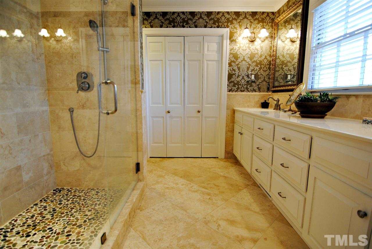 304 Foxhall Street Raleigh, NC 27609 - Photo 13 of 25 a bathroom with shower