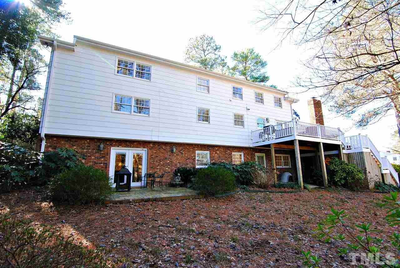 304 Foxhall Street Raleigh, NC 27609 - Photo 22 of 25 a view of a house with backyard and plants