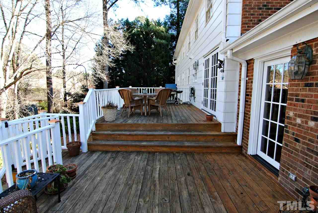 304 Foxhall Street Raleigh, NC 27609 - Photo 24 of 25 a view of backyard with deck and wooden floor