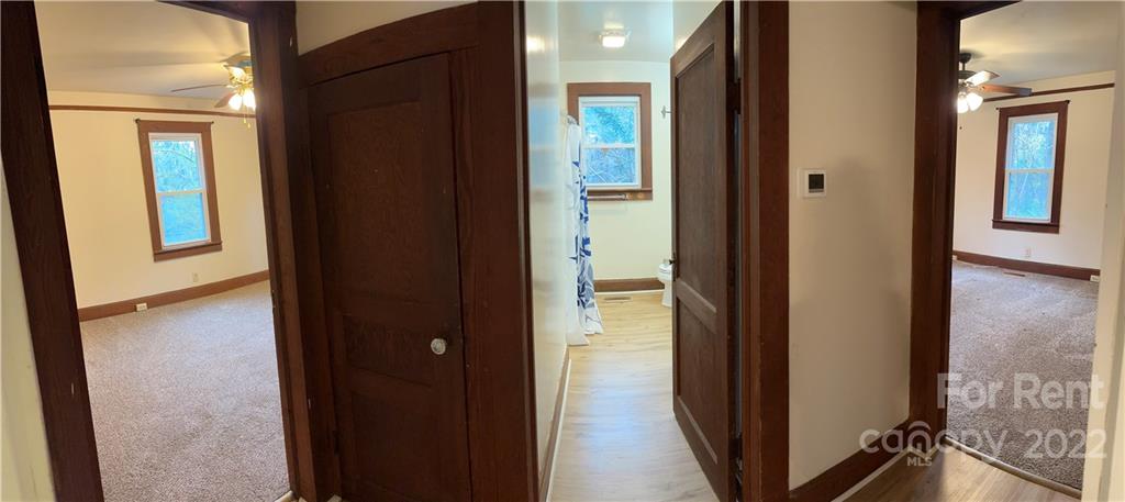133 Lockhart Road Tryon, NC 28782 - Photo 13 of 17 a view of a bathroom from a hallway
