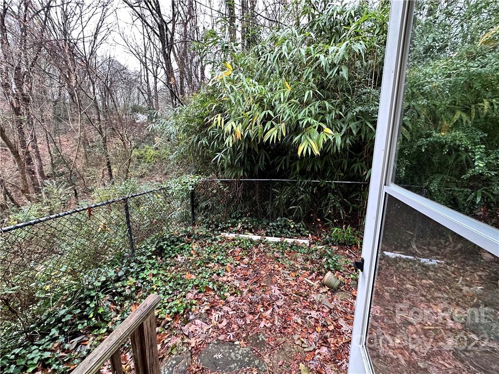 133 Lockhart Road Tryon, NC 28782 - Photo 15 of 17 a view of a pathway with a tree