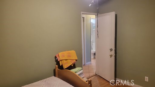 10471 Haddon Avenue Pacoima, CA 91331 - Photo 16 of 23 a living room with furniture and a mirror