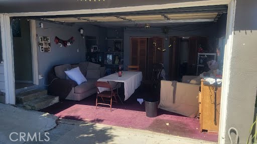 10471 Haddon Avenue Pacoima, CA 91331 - Photo 19 of 23 a dining room with furniture and a window