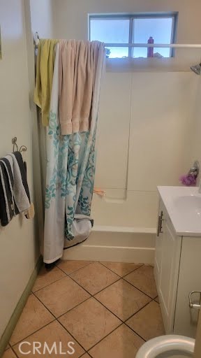 10471 Haddon Avenue Pacoima, CA 91331 - Photo 20 of 23 a bathroom with a shower and a sink