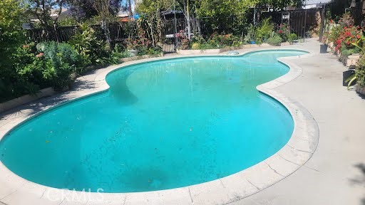 10471 Haddon Avenue Pacoima, CA 91331 - Photo 3 of 23 a view of a swimming pool in a backyard