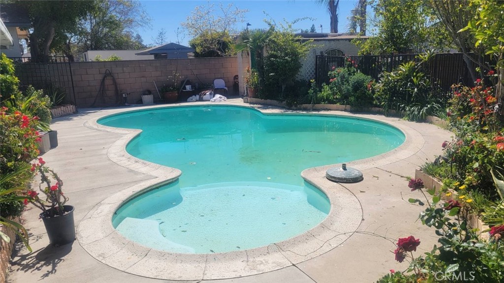 10471 Haddon Avenue Pacoima, CA 91331 - Photo 4 of 23 a view of a swimming pool with sitting area