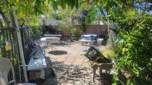 10471 Haddon Avenue Pacoima, CA 91331 - Photo 5 of 23 a view of a water fountain and a bench