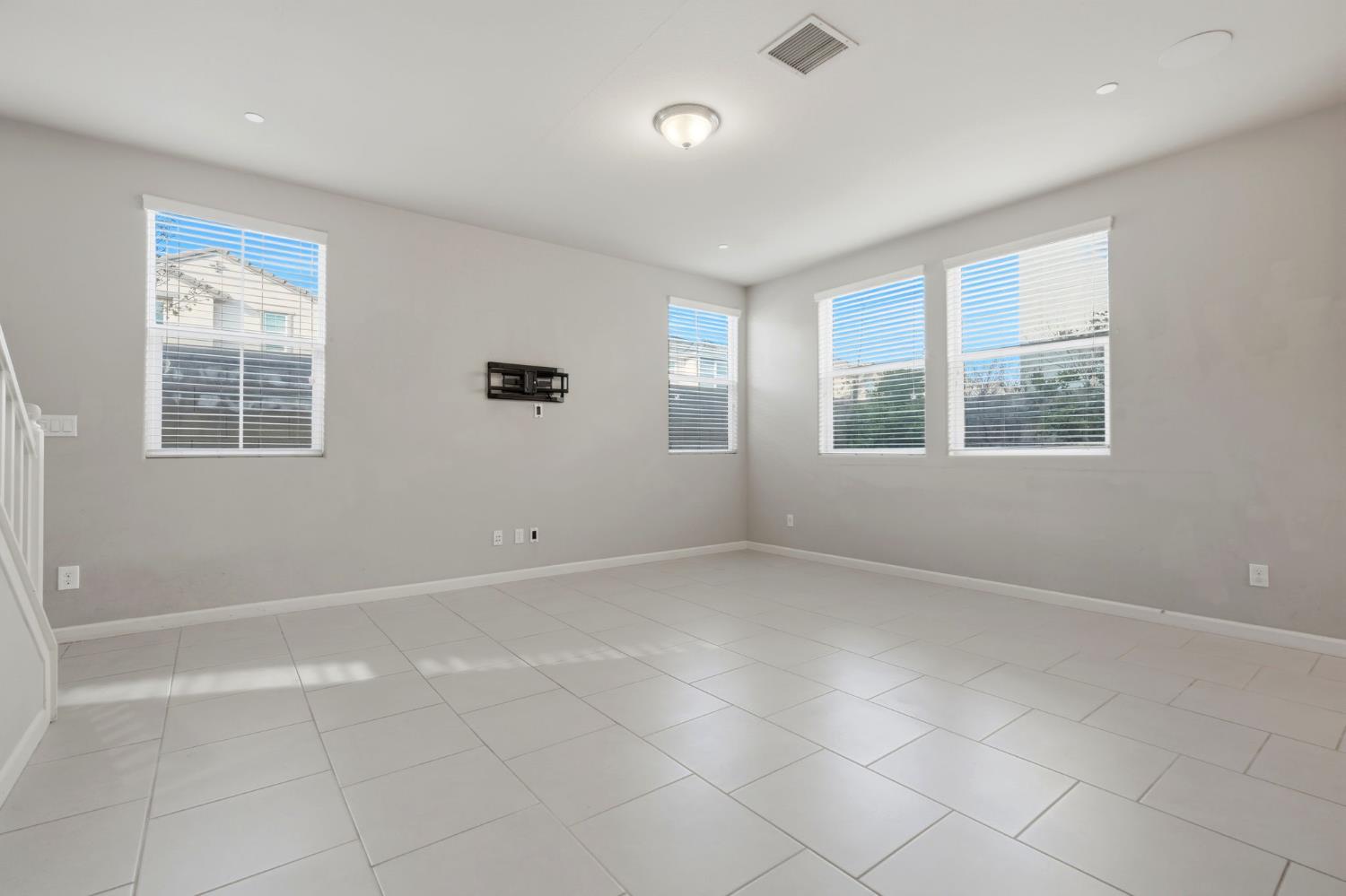 1515 Zenith Clovis, CA 93619 - Photo 11 of 41 a view of an empty room with a window