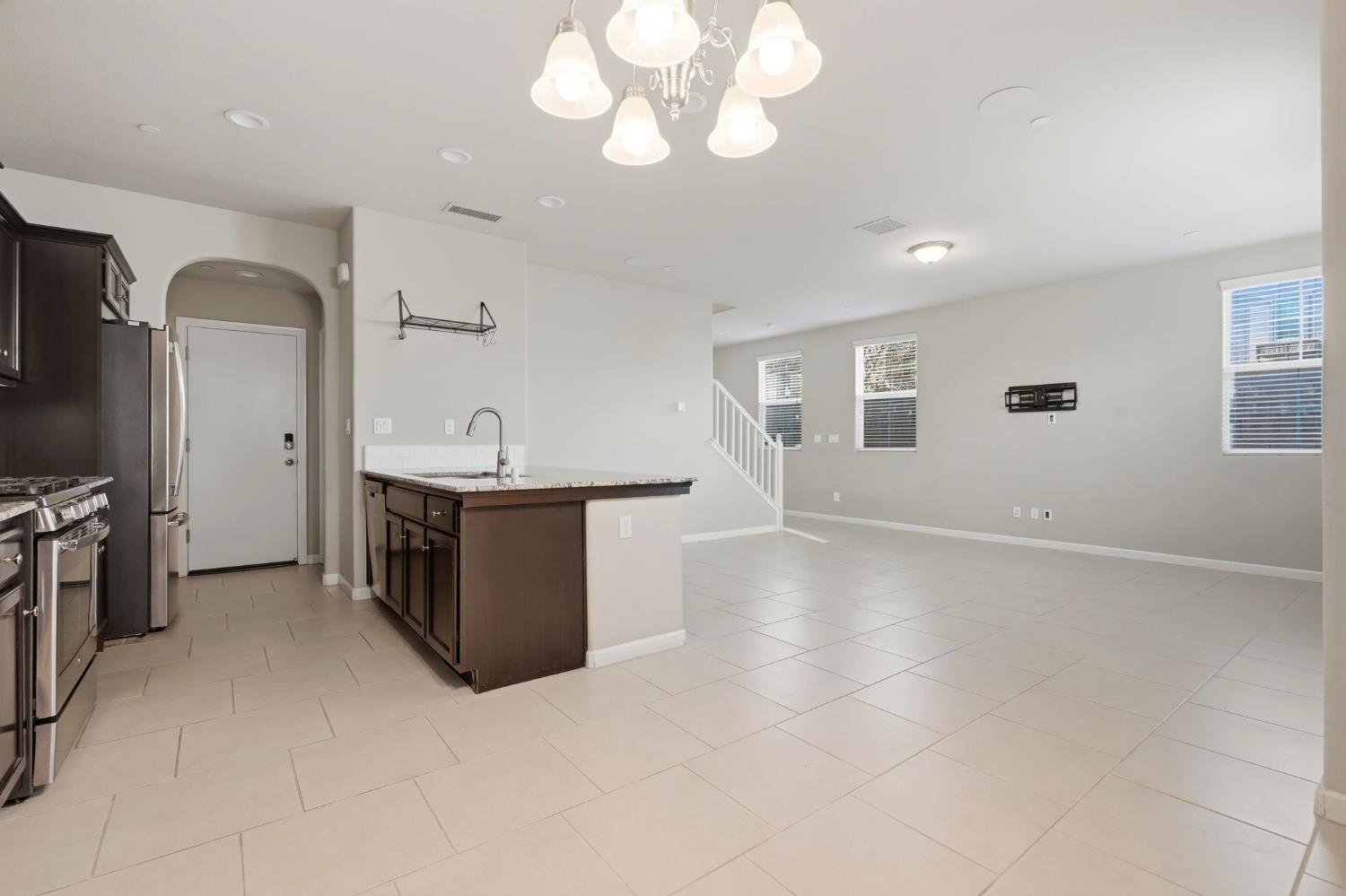 1515 Zenith Clovis, CA 93619 - Photo 19 of 41 a view of a kitchen with a sink