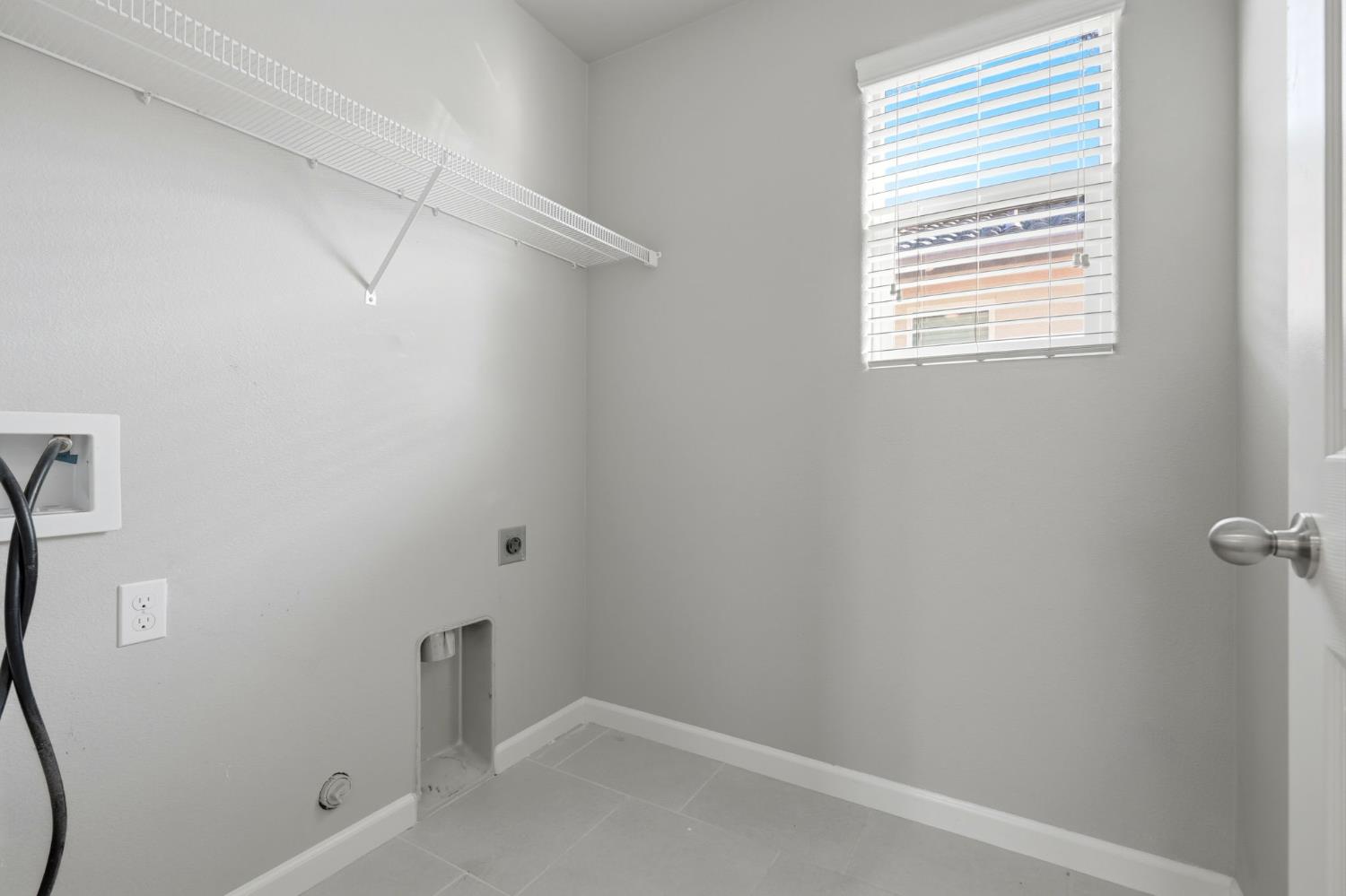 1515 Zenith Clovis, CA 93619 - Photo 25 of 41 a view of a small space with racks on the wall