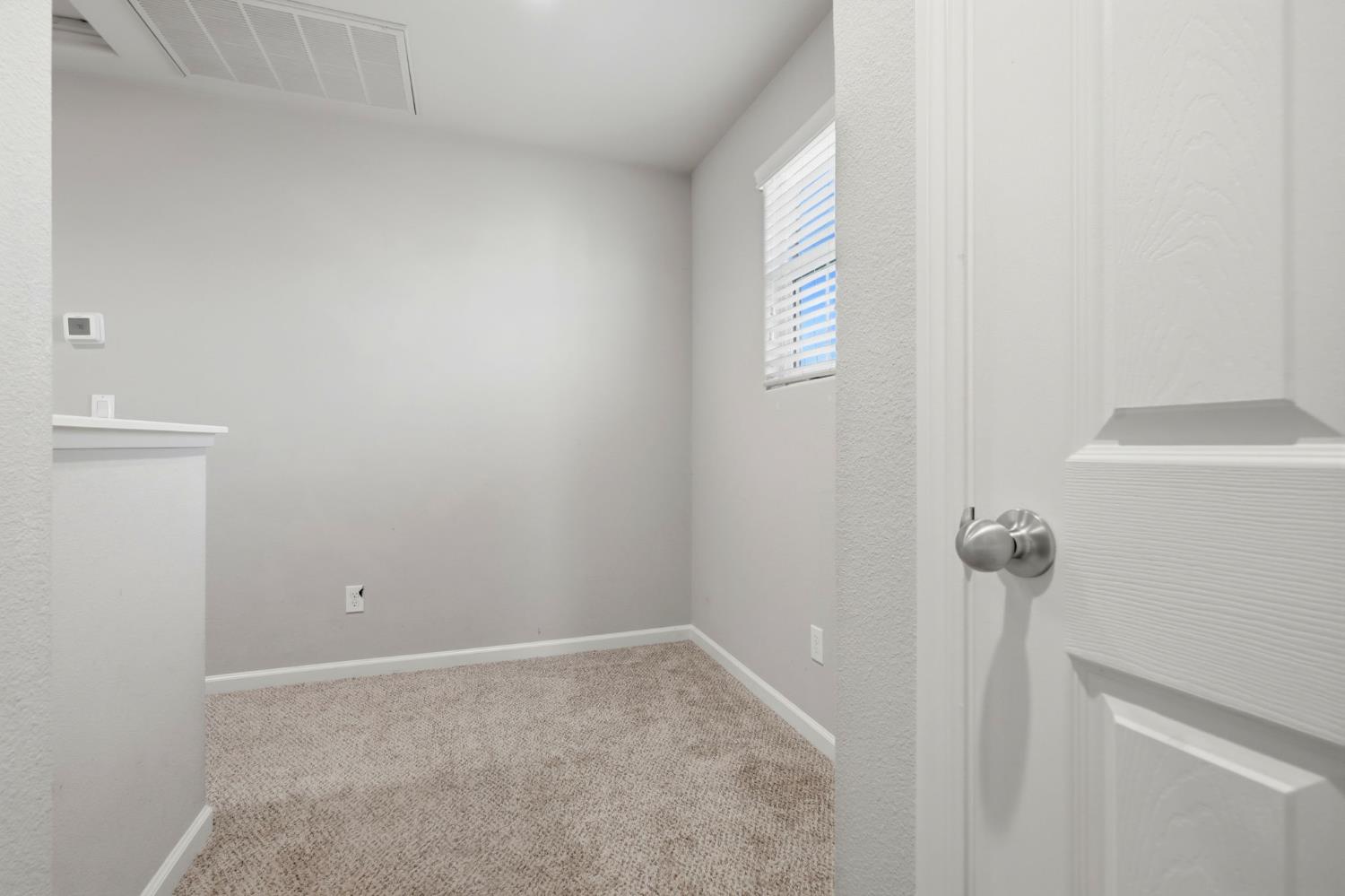 1515 Zenith Clovis, CA 93619 - Photo 30 of 41 a view of a room with rack on the wall
