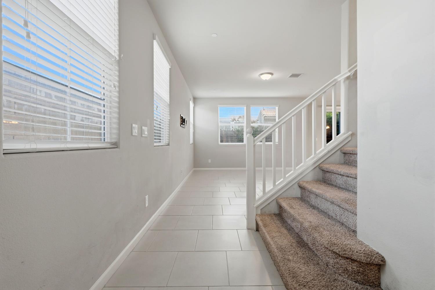 1515 Zenith Clovis, CA 93619 - Photo 6 of 41 a view of entryway and hall with wooden floor