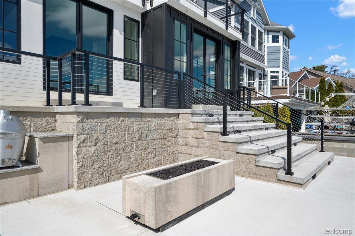 13459 Haddon Street Fenton, MI 48430 - Photo 63 of 84 View of patio / terrace featuring area for grilling and a fire pit